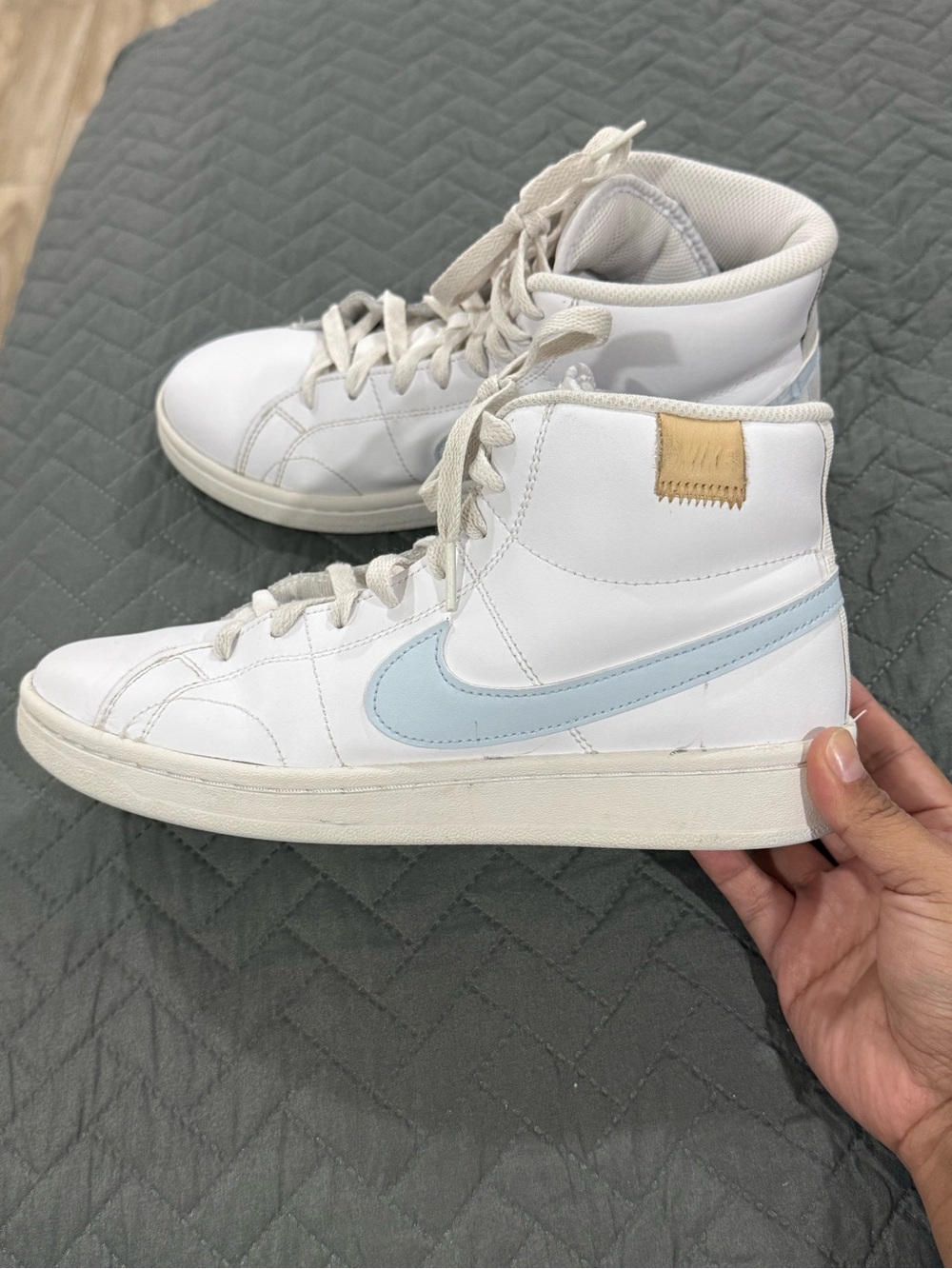 Nike White High-Top Sneakers with Light Blue Swoosh and Tan Accent